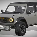 Rugged Off Road Vehicle with Black Roof Yellow Headlights Large Tires and UK License Plate