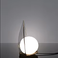 Modern Sleek Table Lamp With Curved Metallic Frame And White Globe Shade 3d model