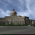 European Style Architectural Building With Golden Dome White Facade Columns And Plaza Greenery