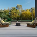 Wicker Leisure Chairs With Yellow Cushions On Sunny Outdoor Patio With Green Plants And Trees