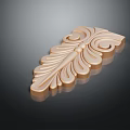 Ornate Golden Carving With Intricate Curved Feather Like Patterns