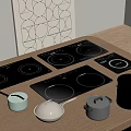 Modern Kitchen Appliances On Wooden Countertop With Induction Cooktops And Pots