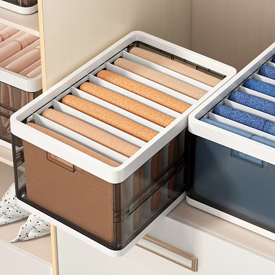 Neatly Folded Colorful Clothes In Transparent Storage Boxes For Closet Organization 3d model