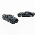 Two Black Sports Car Models Showcasing Sleek Exterior And Detailed Design Features