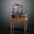 Vintage Industrial Machinery Model With Metal Structure And Large Wheel On Wooden Table