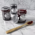 Artisanal Fruit Jam Jars With Strawberry Raspberry Currant And Wooden Spoon On Marble Countertop