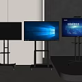 Three Televisions on Wheeled Stands with Screens Showing Different Content in Modern Interior