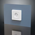 Sleek White Switch Panel Mounted on Blue Wall With Modern Design