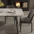 Modern Dining Table Set With Six Grey Chairs Floral Centerpiece And Fireplace