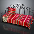 Vintage Iron Bed Frame With Red Striped Bedspread Pillow And Plaid Blanket