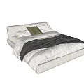 Modern White Double Bed With Striped Duvet Green Pillow And White Pillows