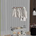 White Metal Clothes Rack with Hanging Light Colored Clothes and Storage Shelf for Home Bedroom