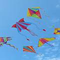 Vibrant Colorful Kites With Various Shapes And Designs On Blue Background