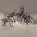 Intricate Wire Mesh Sculpture Installation In Art Exhibition Space With Adult And Child Observing