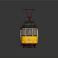 Vintage Yellow Tram With Red Trolley Pole On Stone Paved Rail Tracks