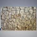 Natural Stone Wall with Irregular Shaped Tiles and Varied Gray Brown Tones Rustic Textured Surface