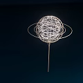 Illuminated Art Installation Featuring Spherical Wire Structure And Circular Rings On Thin Metal Stand 3d model