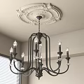 Elegant Black Metal Chandelier With Crystal Accents And Classic Ceiling Medallion In Modern Interior Space
