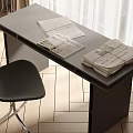 Modern Dark Desk With Stacked Newspapers Black Chair And Wooden Floor