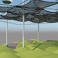 Sports Equipment Featuring Black Mesh Structure Over Green Turf With White Poles And Gray Seats
