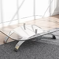 Modern Glass Top Coffee Table With Curved Metal Legs On Gray Carpet Wooden Floor