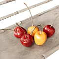 Fresh Red and Yellow Cherries Arranged on Bamboo Tray for Healthy Fruit Snacks