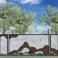 Feature Wall With Relief Design Gray Brown Rockery Under Green Trees Blue Sky