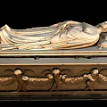 Ancient Golden Sarcophagus With Recumbent Figure Sculpture And Intricate Carvings On Ornate Base