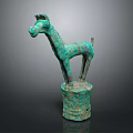 Ancient Bronze Animal Sculpture With Greenish Patina Standing On Cylindrical Pedestal Base