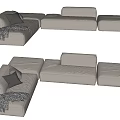 Light Colored Upholstered Sectional Sofa With Gray Cushions And Throw Blanket 3d model