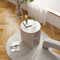 Modern Minimalist Side Table In Living Room With Grey Armchair Wooden Floor And Green Plant