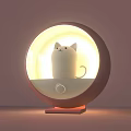 Round Design Table Lamp With White Cat Shaped Figure And Warm Cozy Light