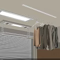 Smart Clothes Drying Rack With Hanging Clothes And Overhead Light In Indoor Setting