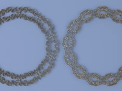 Elegant Silver Carved Circular Decorative Ornaments Featuring Intricate Curved Spiral Patterns 3d model