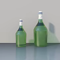Two Large And Small Green Wine Bottles On Grey Table With White Caps And Labels