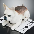 French Bulldog Doll White And Brown Lying On Square Pattern Mat