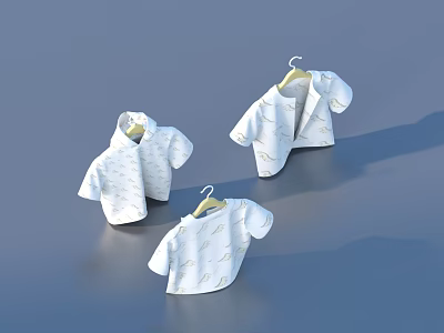 Cute White Baby Clothes With Gold Patterns Hanging On Three Hangers 3d model