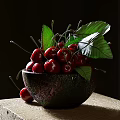 Fresh Red Cherries in Dark Shiny Bowl with Green Leaves and Single Cherry on Table