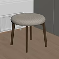 Round Upholstered Dining Chair With Dark Wooden Legs In Minimalist Interior