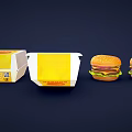 Two Juicy Delicious Hamburgers With Fresh Lettuce And Yellow Open Takeout Boxes