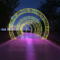 Illuminated Circular Arches With Decorative Patterns Along Stone Path Surrounded By Trees At Night 3d model