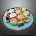 Traditional Assorted Desserts on Blue Plate with Coconut Sesame Coating and Stuffed Fillings