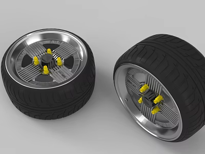 Automotive Tire Design With Black Tread Silver Rim And Yellow Accents 3d model