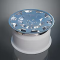 Shiny Chrome Car Wheel Rim With Intricate Spoke Design And Brand Logo
