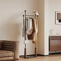 Freestanding Clothing Rack With Clothes And Bag In Minimalist Living Room