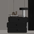 Black Drawer Bedside Table With Architecture Books Table Lamp And Decorative N