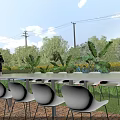 Outdoor Table with White Chairs in Garden Setting Surrounded by Green Plants and Blue Sky