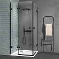 Modern Shower Head in Glass Enclosure with Tiled Wall and Towel Rack