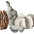 Elegant Handcrafted Decorative Sculptures With Textured Materials And Organic Shapes