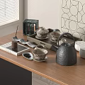 Traditional Tea Set with Teapot Teacups and Iron Kettle on Wooden Table by Window